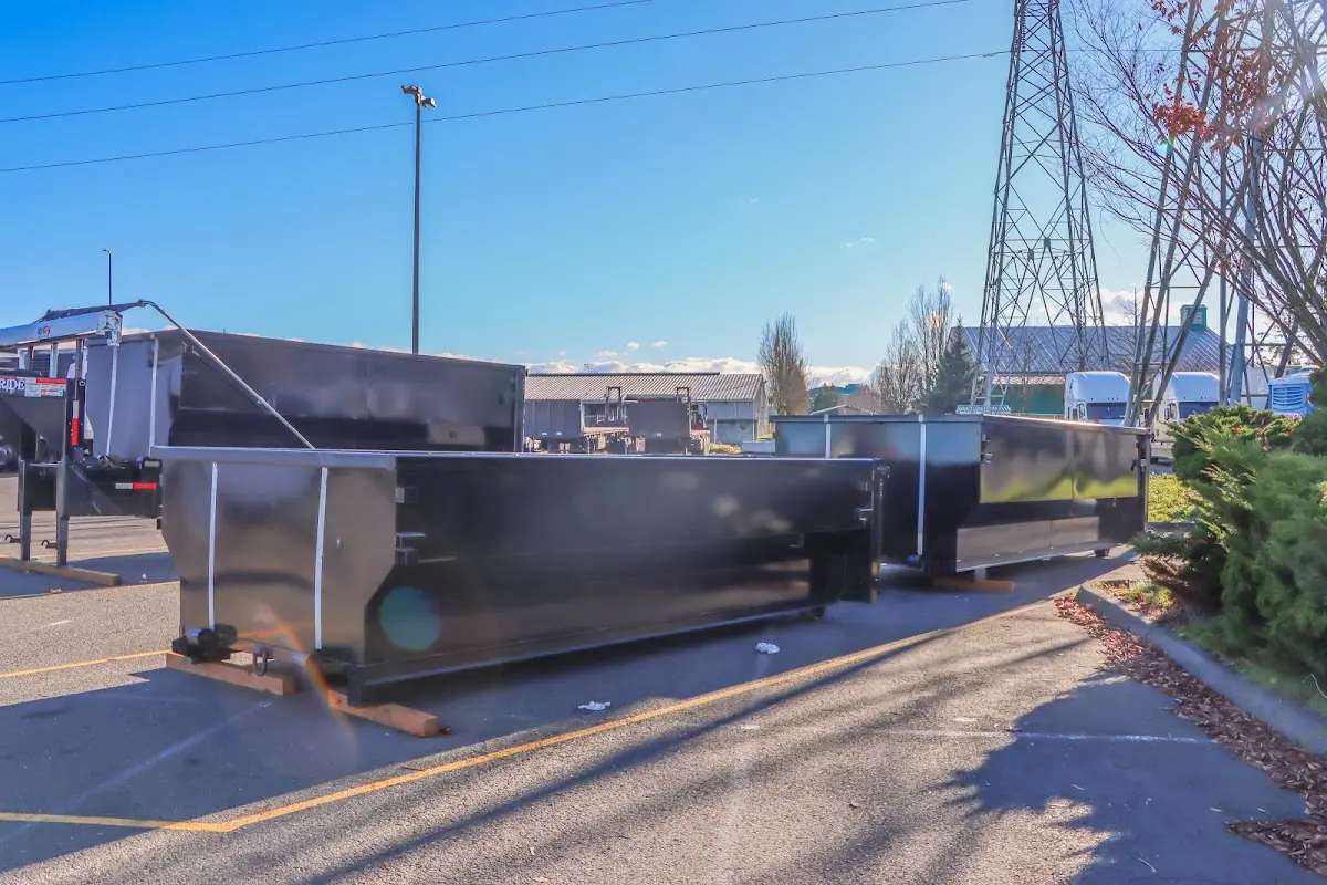 Roll-off dumpster ready for waste disposal at job site for Concrete Dumpster Rental in Moore